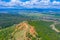 Panorama of sand pyramides and Bulgarian town Stob