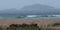 Panorama of Sandwood Bay, Highlands of Scotland. Remote bay with white sand, dunes and reeds. Located on the far north west coast.