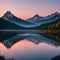 Panorama scenic of mountain lake with perfect reflection at sunrise. beautiful mountain range landscape with