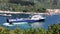 Panorama of Scenic Queen Charlotte sound and port with ferry leaving