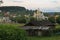 Panorama of Schodnica on slope of forested mountains.