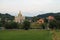 Panorama of Schodnica on slope of forested mountains.