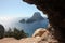 Panorama on the sea of â€‹â€‹Cala D`Hort among the rocky, rocky and arid cliffs in front of the almost Caribbean blue Ibizan sea