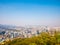 Panorama Seoul cityscape view from Namsan Hill.Blank space blue sky bacground.