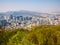Panorama Seoul cityscape view from Namsan Hill.Blank space blue sky bacground.