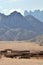 Panorama of the settlement of local residents and ATVs tourists. Arabian desert, Egypt.