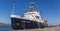 Panorama of a ship at the quay of the city harbor in Rostock