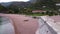 Panorama shot of elegant lady walking on the stone bridge