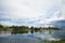 Panorama shot of peaceful riverside city landscape in country side