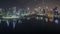 Panorama showing aerial view to Dubai Business Bay and Downtown with the various skyscrapers and towers night timelapse