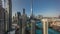 Panorama showing Dubai Downtown cityscape with tallest skyscrapers around aerial timelapse.