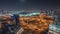 Panorama showing Dubai marina and JLT skyscrapers along Sheikh Zayed Road aerial night timelapse.