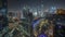 Panorama showing futuristic skyscrapers in financial district business center in Dubai night timelapse
