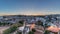 Panorama showing Jardim do Torel day to night timelapse with views to the city center of Lisbon after sunset. Portugal