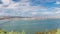 Panorama showing Lisbon cityscape and Tagus river timelapse with 25 of April bridge