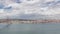 Panorama showing Lisbon cityscape and Tagus river timelapse with 25 of April bridge