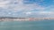 Panorama showing Lisbon cityscape and Tagus river timelapse with 25 of April bridge