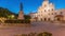 Panorama showing Sa da Bandeira Square with a view of the Santarem See Cathedral day to night timelapse. Portugal