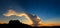 Panorama silhouette sunset with mountain and sky.