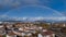 Panorama of siska district in Ljubljana, Slovenia accompanied by beautiful rainbow spanning over the horison over the Smarna Gora