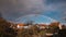 Panorama of siska district in Ljubljana, Slovenia accompanied by beautiful rainbow spanning over the horison over the Smarna Gora