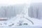 Panorama of ski resort Kopaonik, Serbia, skiers, lift, pine trees