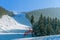 Panorama of ski resort, slope, people on the ski lift