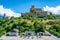 Panorama with small cafe place at bottom of the hill with Valere basilica also called Valere castle in Sion Valais Switzerland