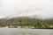 Panorama of small Seydisfjordur town in Iceland in overcast weather