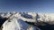 Panorama on snow capped mountain peaks and ridges of the majestic italian alpine arc in winter season and Christmas time