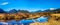 Panorama of the Snow covered Golden Ears Mountain and Edge Peak seen from the of Pitt-Addington Marsh in the Fraser Valley