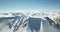 Panorama of snow mountains. The tops of the peaks. Epic moments drone.