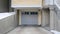 Panorama Snowy home with gray glass panelled garage door and stairs going to porch