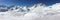 Panorama of snowy mountain peaks and ski slopes at Tignes, ski resort in the Alps France