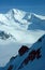 Panorama of snowy mountains and high alpine peaks in wintery Bernese Oberland in Switzerland