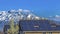 Panorama Solar panels installed on the roof of home against snowy mountain and blue sky