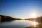 Panorama of Sotsko Jezero, or lake Sot, in Fruska Gora, in Serbia, Europe, in summer, at dusk, into the light.