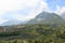 Panorama with South Tyrolean Apple plantations, vineyards and mountains in Tirolo, South Tyrol, Italy