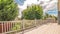 Panorama Spacious balcony of home with view of trees and cloudy blue sky on a sunny day