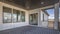 Panorama Spacious balcony of home with white wall and round lights on the brown ceiling