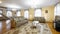 Panorama of spacious hall with couches for relax
