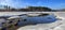 Panorama. Spring landscape. Riverbed on a sunny day.