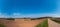 Panorama of spring plowed field