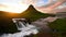 Panorama Spring in western Iceland Kirkyufetl mountain waterfall cascades at sunset