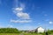 Panorama of summer city in quiet urban area with lots of foliage