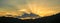 Panorama summer sunset golden cloud summertime light sunny day cloudscape mountain scene. Panoramic sunset golden skyline sun beam