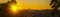 Panorama summer sunset golden cloud summertime light sunny day cloudscape mountain scene. Panoramic sunset golden skyline sun beam