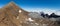 Panorama with summit of Uri Rotstock mountain in Swiss alps, blue sky