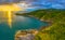 Panorama sunset above Promthep cape is a mountain of rock that extends into the sea in Phuket Thailand.