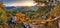 Panorama of sunset in a Carpathian mountain valley with wonderfu